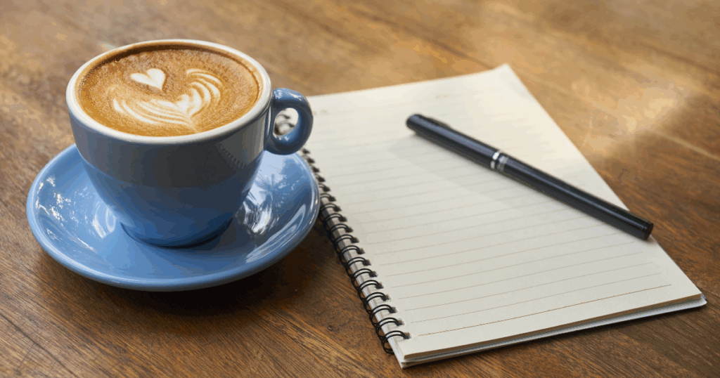 Morning coffee with journal pad and ink pen