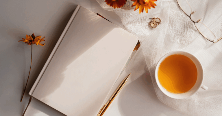 Journal flat lay with tea